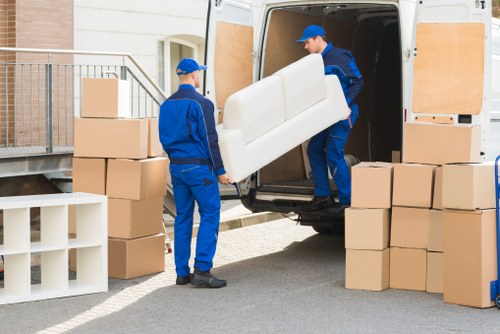 Van moving boxes from a flat in Ladbroke Grove