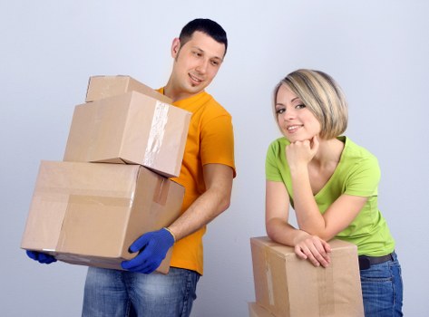 Careful loading of furniture and boxes for a West London move