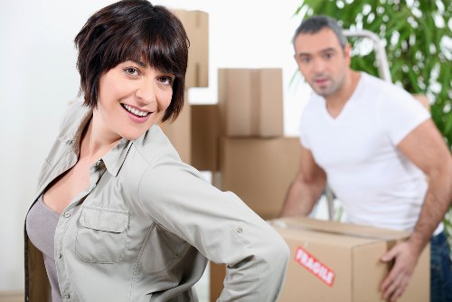 Loading furniture and boxes into a removal truck for a west London move
